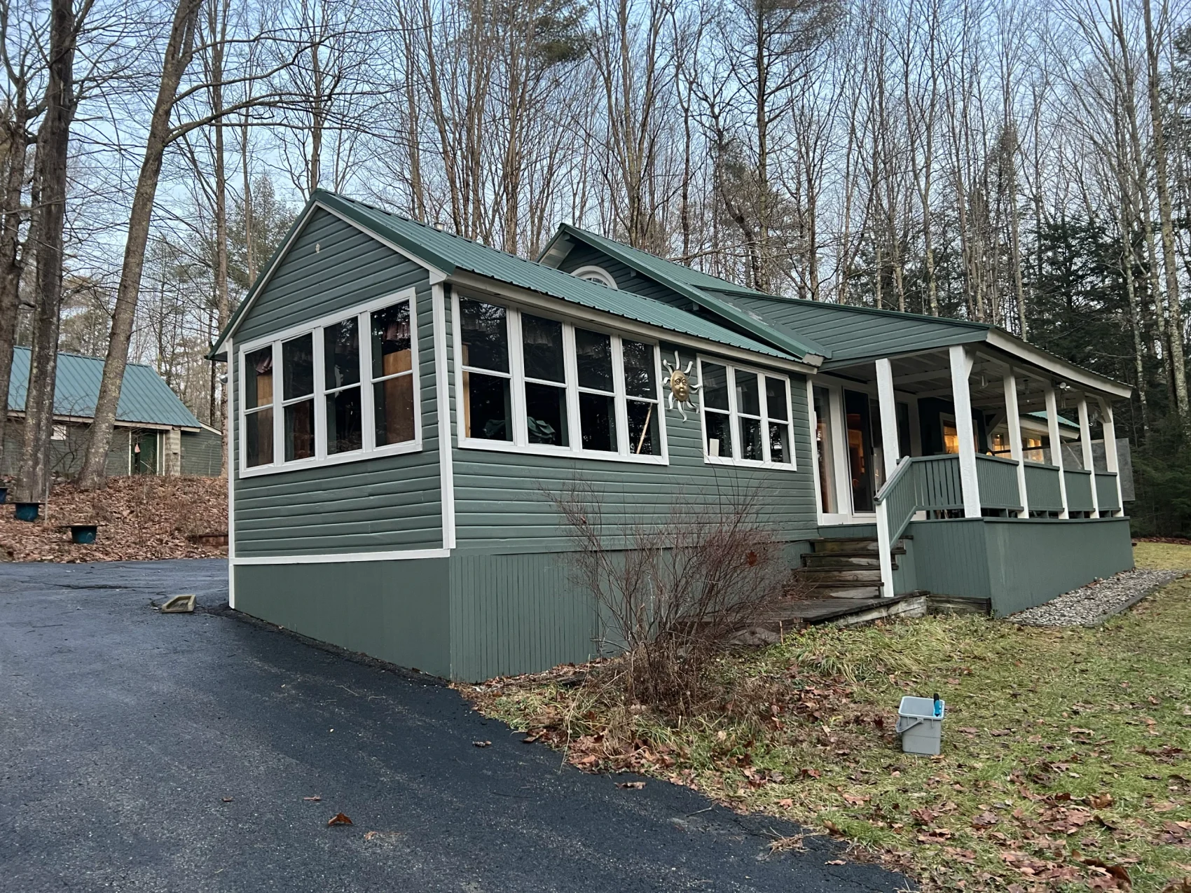 A Maine cottage with a sunroom, windows freshly cleaned